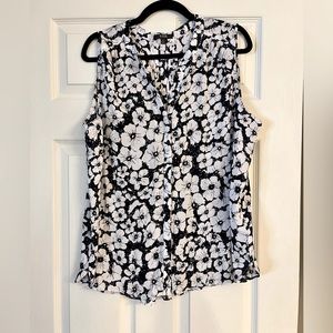 Navy and white floral blouse.